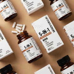 Supplement bottles and boxes labeled '5-IN-1' on a beige background